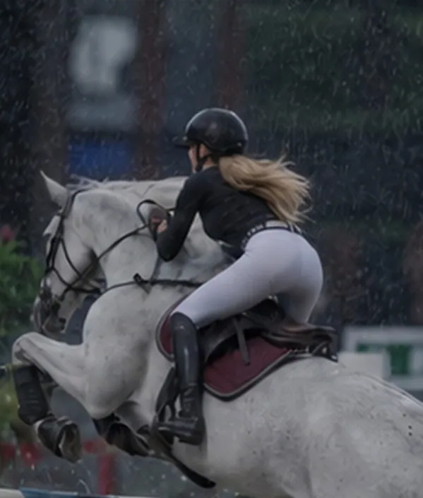 Polina Avdenis with horses: show jumping, training and work with children
